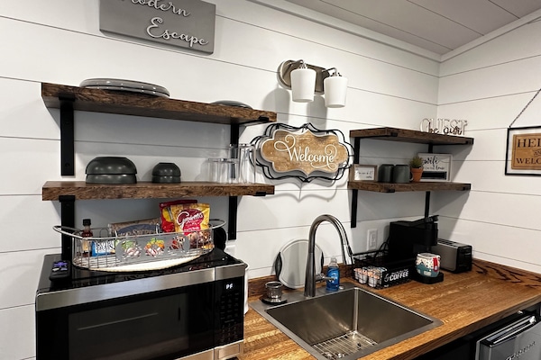 Fridge, microwave, coffee/tea maker, toaster