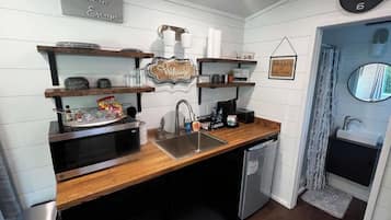 Fridge, microwave, coffee/tea maker, toaster