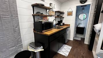 Fridge, microwave, coffee/tea maker, toaster