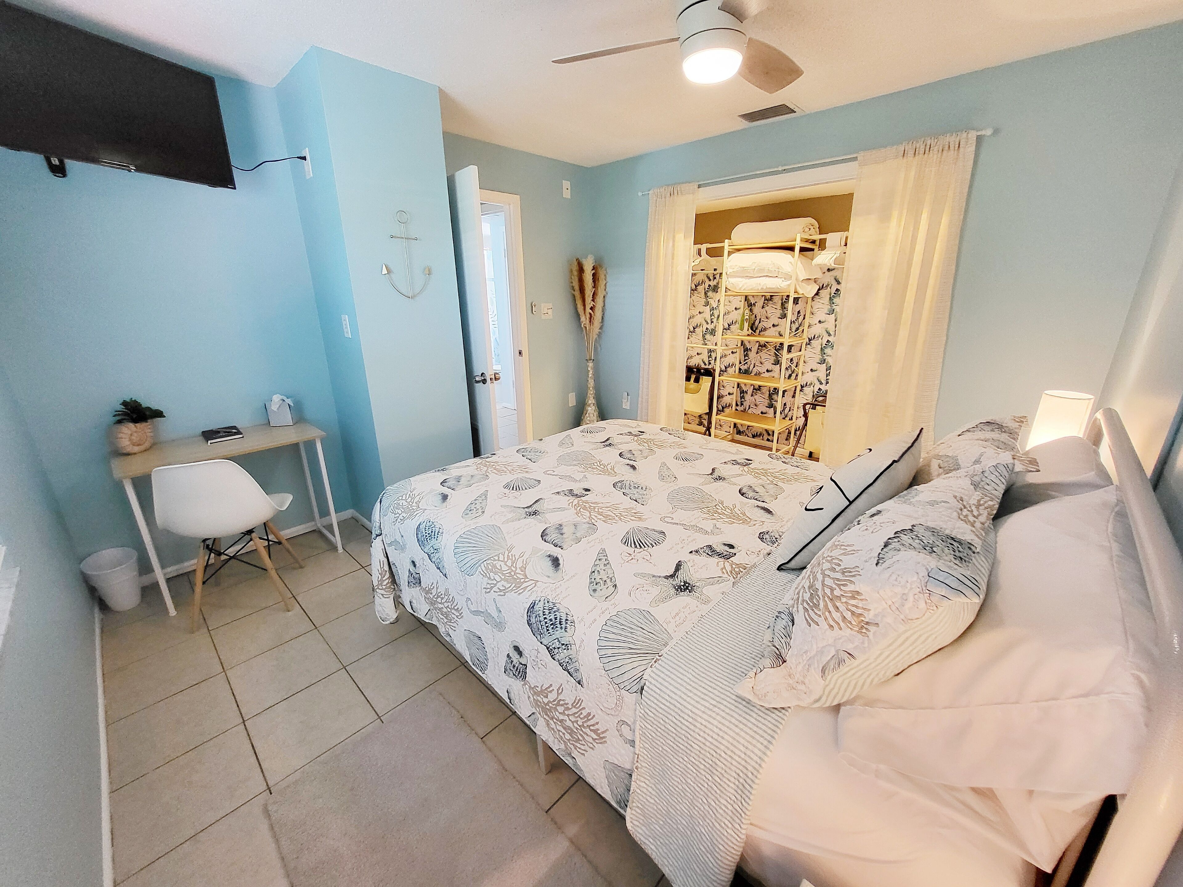 1 bedroom, desk, iron/ironing board, travel crib