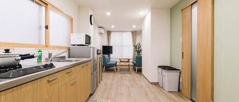 Fridge, microwave, cookware/dishes/utensils