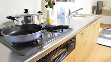 Fridge, microwave, cookware/dishes/utensils