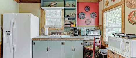 Fridge, microwave, coffee/tea maker, toaster