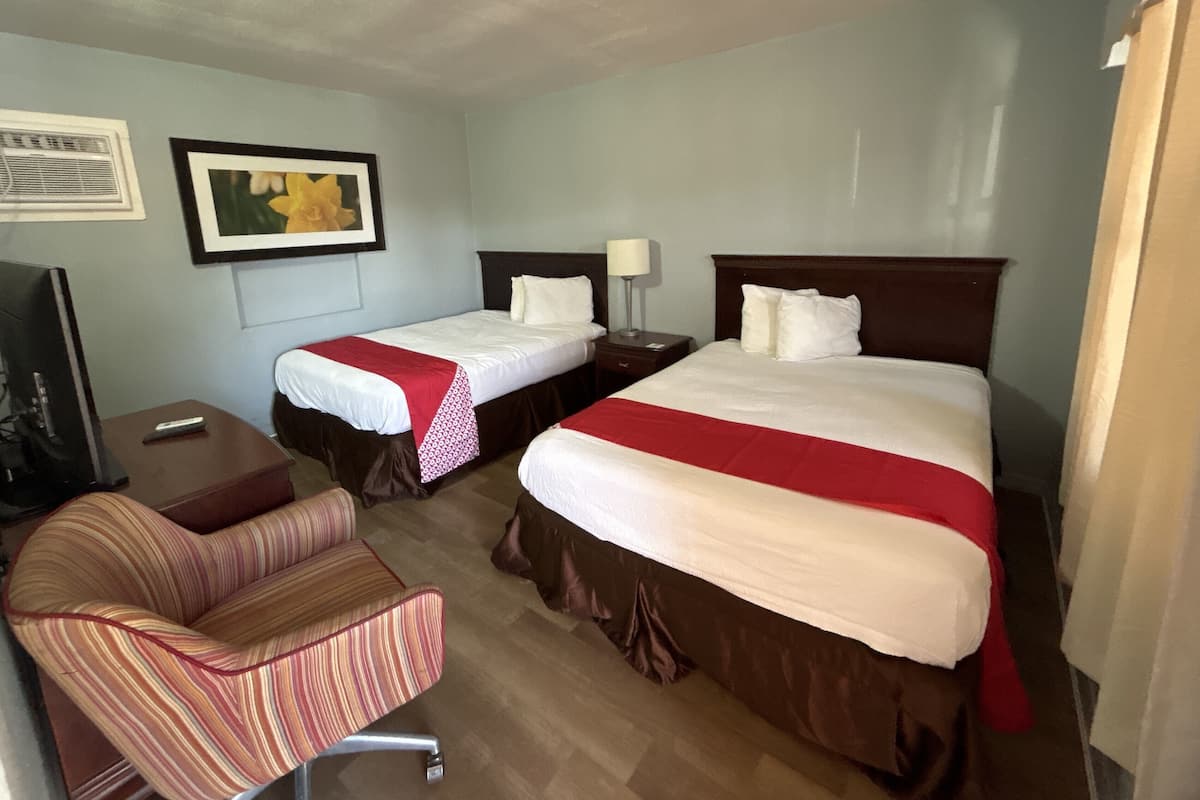 Room, 2 Queen Beds, Non Smoking | In-room safe, iron/ironing board, free WiFi, bed sheets