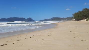 On the beach, white sand