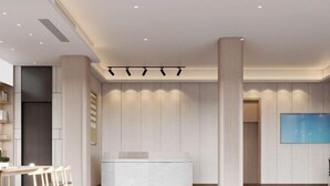 A modern reception area with a curved reception desk, wooden panel walls, and a large blue artwork on the wall. - Haocheng Business Hotel Ruian City (Rui'an)