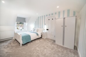 4 bedrooms, iron/ironing board, travel cot, WiFi