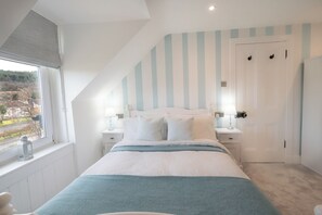 4 bedrooms, iron/ironing board, travel cot, WiFi