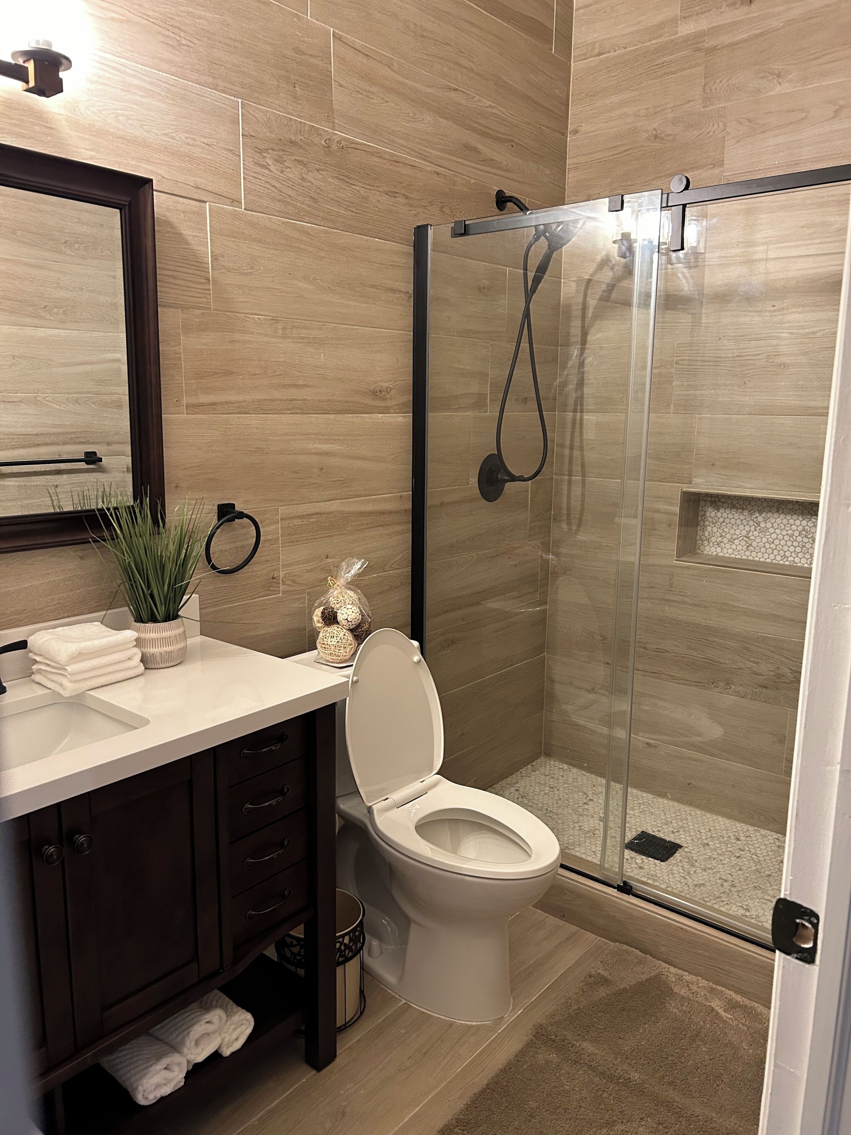 Shower, hair dryer, towels, soap