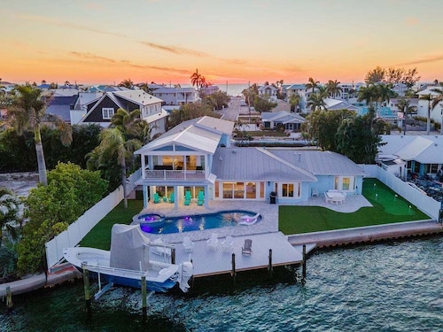 Ocean Sunrise – Bayfront Luxury with Pool, Dock & Game Room. Steps to Gulf. Perfect for Families.