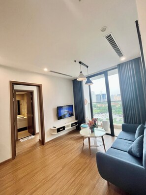 Appartement Standard, balcon, vue sur la ville | Aire de séjour