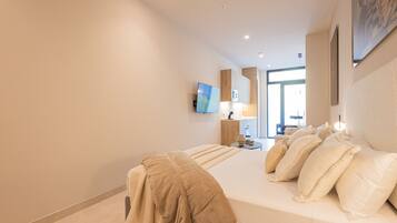 Een strijkplank/strijkijzer, gratis wifi, beddengoed