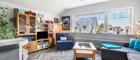 Televisio, DVD-soitin, pöytätennispöytä, stereot