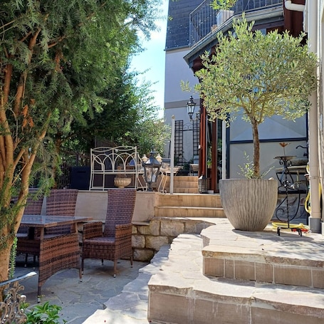 Outdoor dining. Apartment 'Klosterblick' with Private Terrace, Private Garden and Balcony