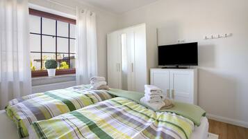 1 quarto, Wi-Fi de cortesia, roupa de cama