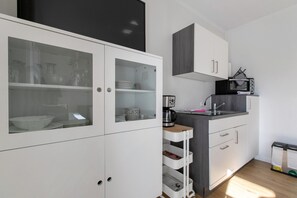 Réfrigérateur, four, plaque de cuisson, lave-vaisselle