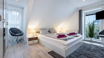 2 habitaciones y ropa de cama