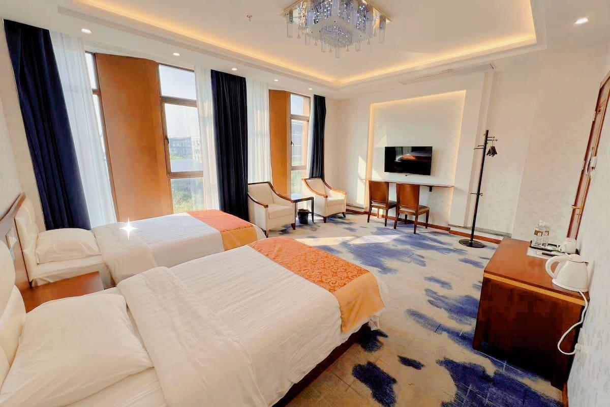 Suite familiar, vista al patio | Wifi gratis y ropa de cama