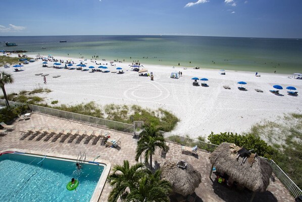 On the beach, beach towels, motor boating