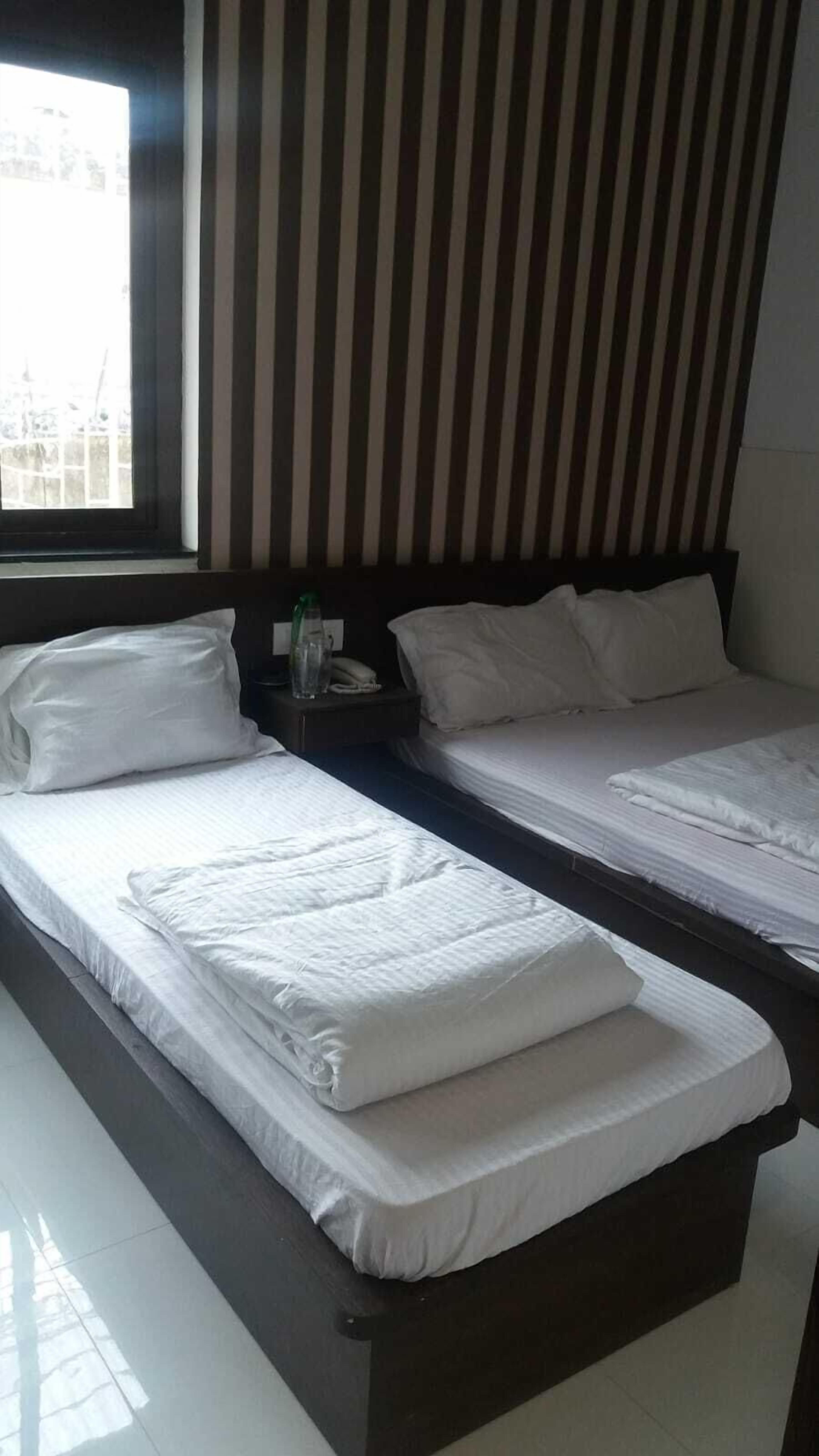 Desk, laptop workspace, free WiFi, bed sheets