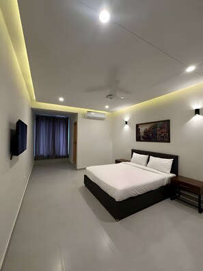 Deluxe Double Room, City View | Iron/ironing board, free WiFi - The Garden Hotel (Islamabad)