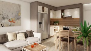 Una sala de estar moderna con sofá, mesa de centro y comedor con sillas y mesa.