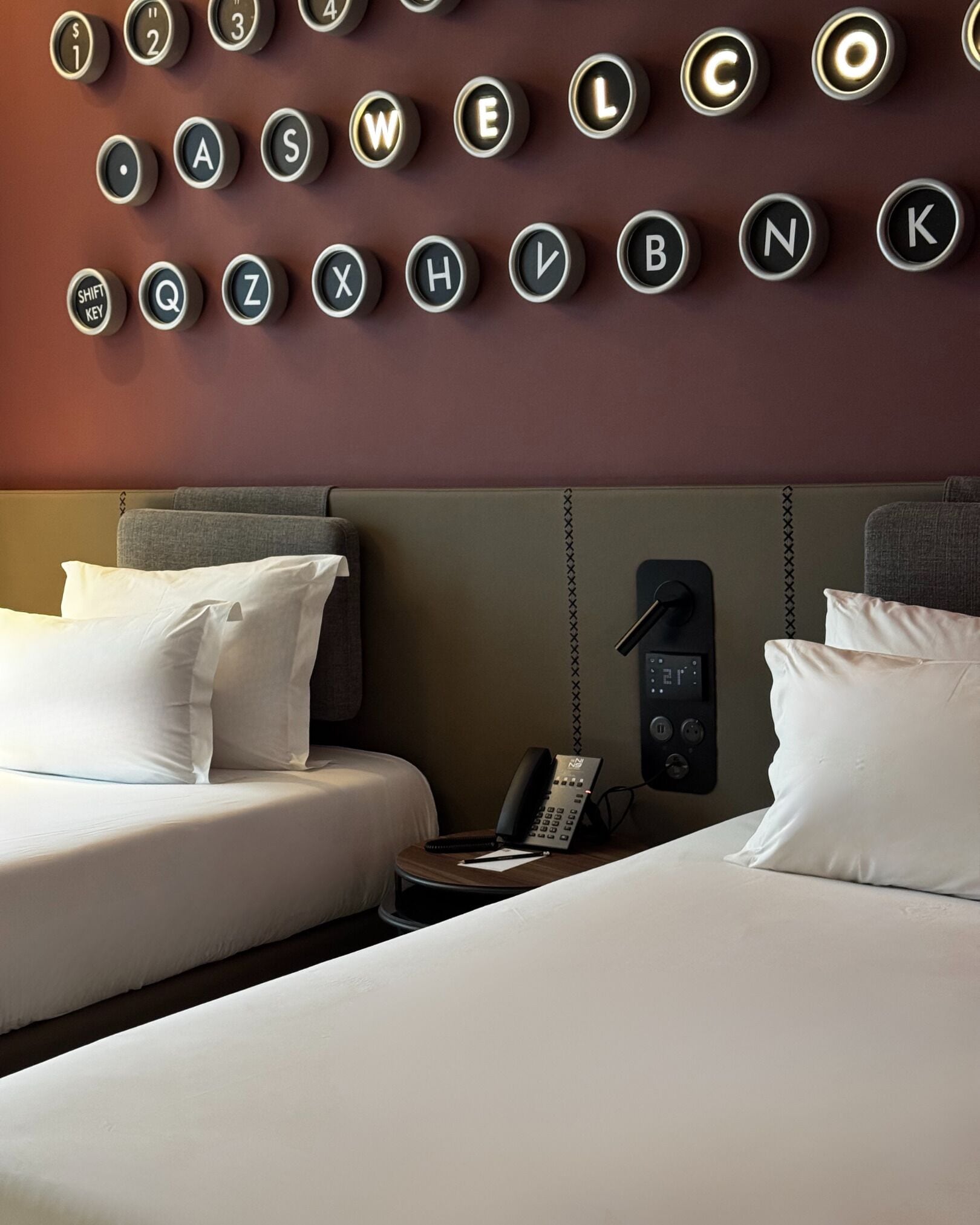 Premium bedding, in-room safe, laptop workspace, soundproofing