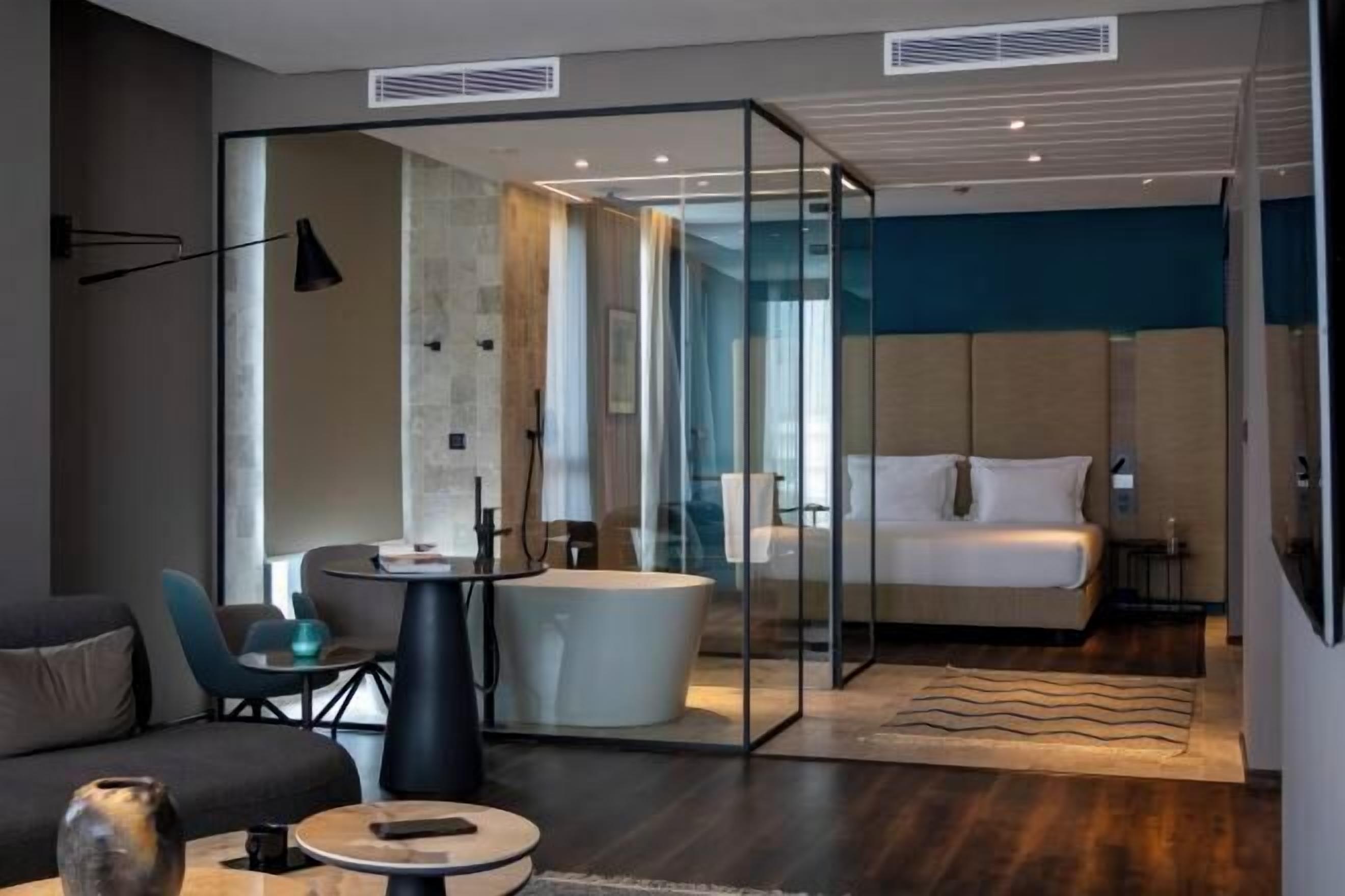 Premium bedding, in-room safe, laptop workspace, soundproofing