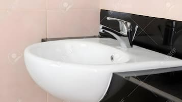 Shower, slippers, towels, soap