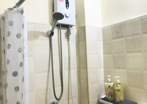 Shower, hair dryer, towels, soap