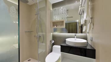 Shower, hair dryer, slippers, towels