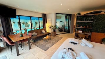 Bungalow Deluxe, alberca privada, vista al jardín | 1 habitación, cortinas blackout y insonorización