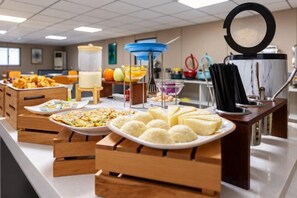 A buffet setup with various food items and a coffee station. - Heyi Express Hotel (Zhuhai Baijiao Science Park Doumen Bus Terminal) (Zhuhai)