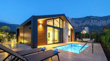 Suite, Private Pool, Pool View | Hypo-allergenic bedding, down comforters, minibar, desk