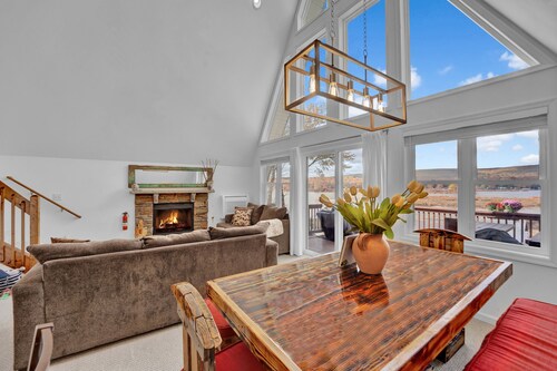 Waterfront, Hot Tub, Dock, Kayaks, Movie/ Game Room, Fire Pit, Fireplace, Deck, Patio, Grill