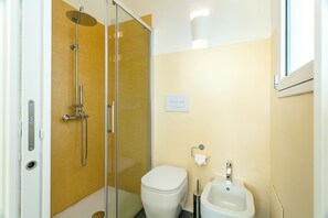 Comfort Double Room, Garden View | Bathroom | Shower, hair dryer, towels, soap