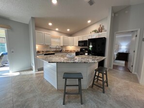 Fridge, microwave, oven, stovetop - Charming 3BR Oasis with Lanai (The Villages)