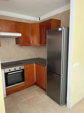 Villa | Private kitchen | Fridge, microwave, oven, electric kettle