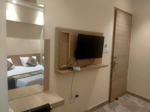 Deluxe Double Room, City View | Living area | TV, printers