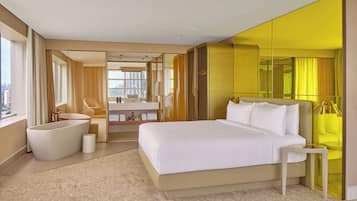 Ropa de cama de alta calidad y caja de seguridad en la habitación