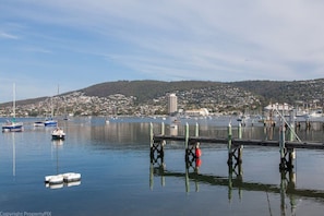 Stunning harbor views with a marina and nearby residential area.