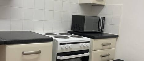 Apartment | Private kitchen | Fridge, microwave, oven, stovetop