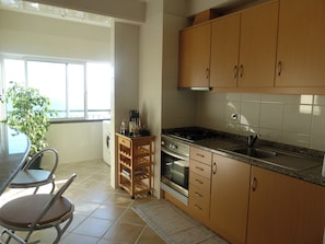 Apartment, Balcony, Sea View | Private kitchen