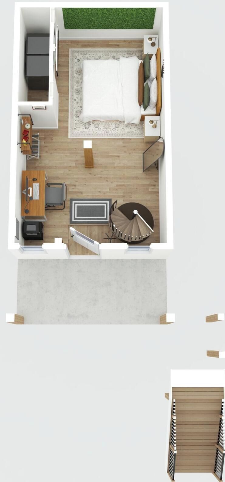 A bedroom with a bed, bedside table, and a small desk area.
