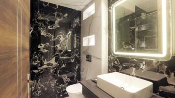 Shower, free toiletries, hair dryer, towels