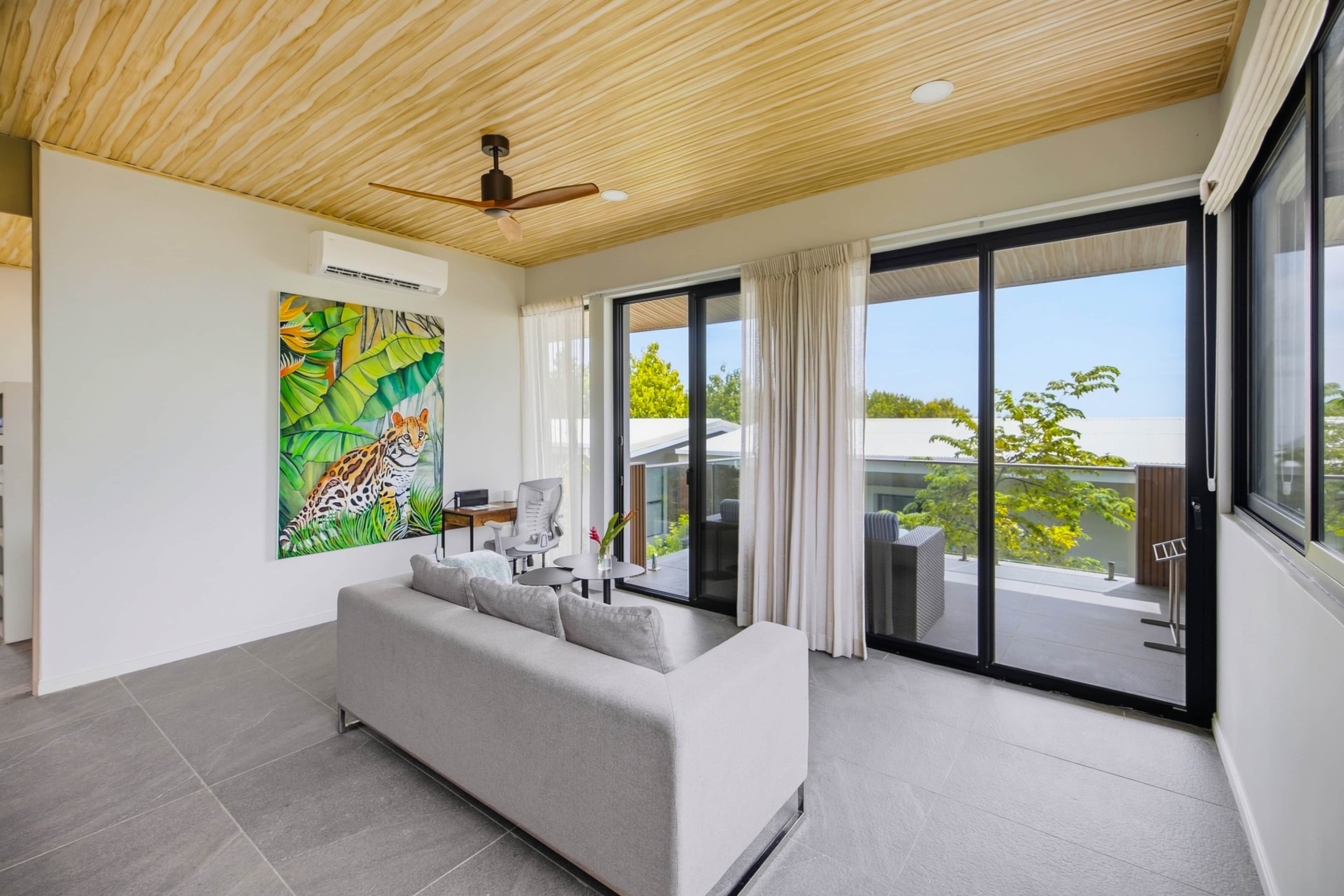Suite-livingroom-work-space-with-garden-view (1)
