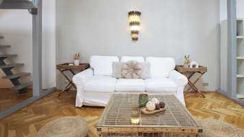 Duplex Studio | Living area | 55-inch flat-screen TV with satellite channels, TV