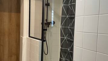 Shower, hair dryer, towels, soap