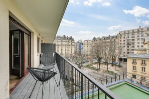 Enjoy breathtaking views of the city from this balcony with a cityscape view.