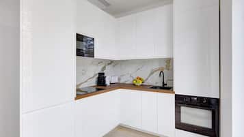 Fridge, microwave, coffee/tea maker, toaster